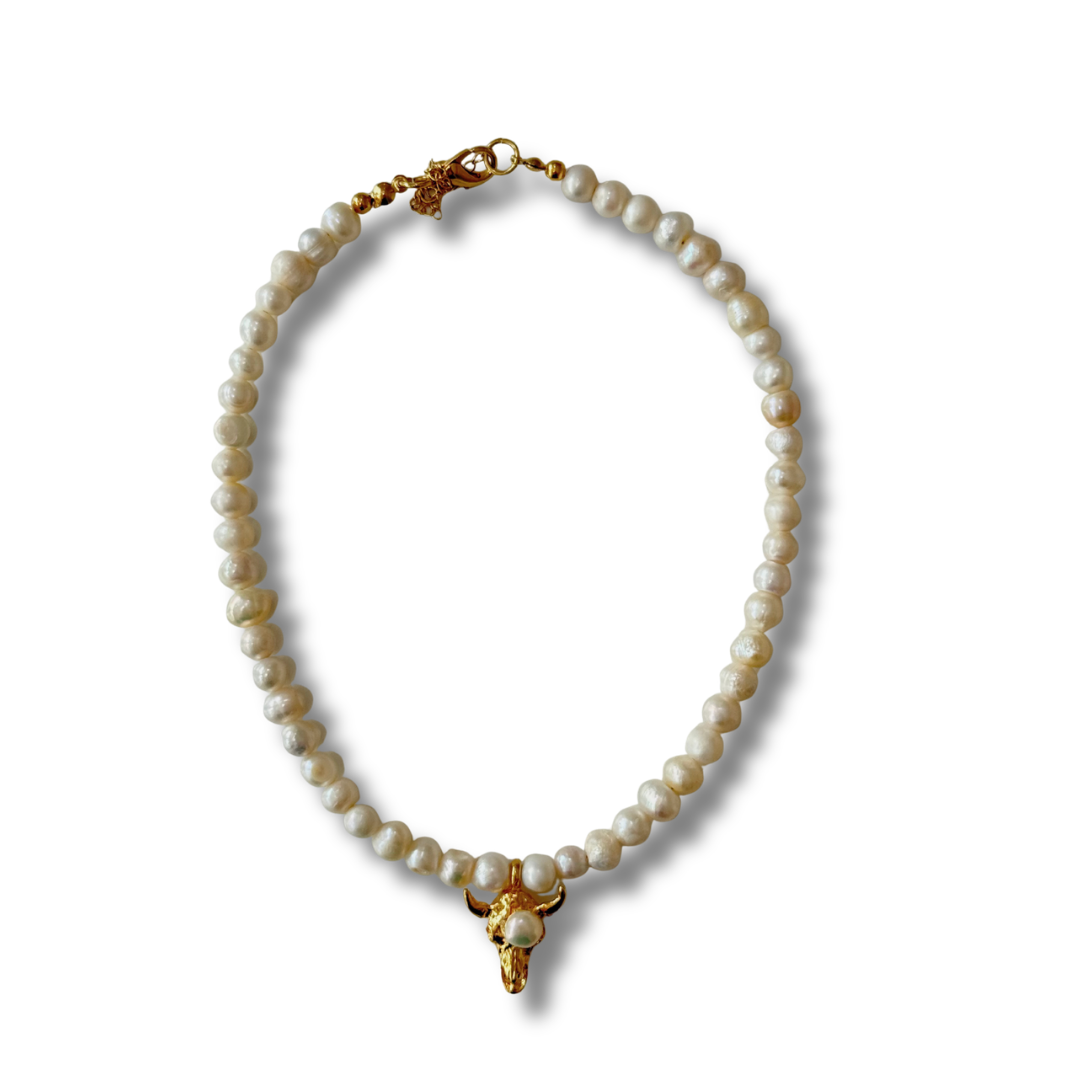 Corbatín perla con Toro