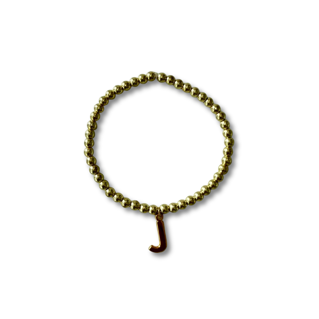Pulsera inicial dorada