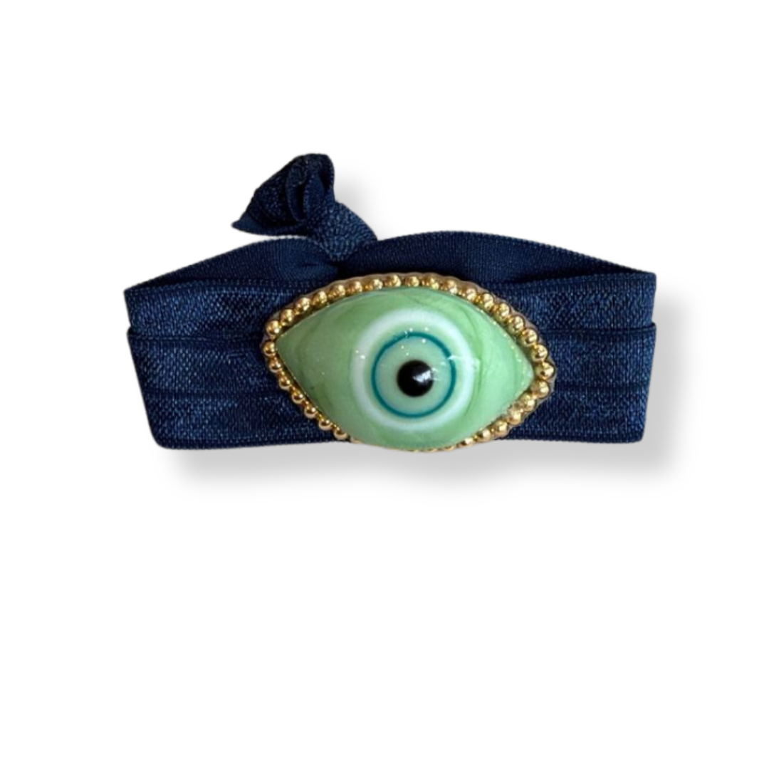 Pulsera tela azul ojo verde